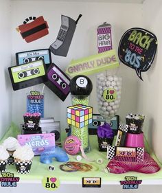 a table topped with lots of different types of decorations and items on top of it