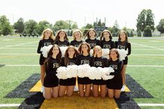 the cheerleaders are posing for a photo on the football field with their pom poms