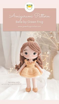 a crocheted doll is standing on a white surface with the words, amigurmi pattern belli by green frog