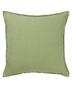 a green pillow on a white background