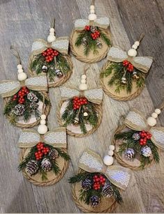 christmas decorations made out of burlocks and pine cones are arranged on the floor