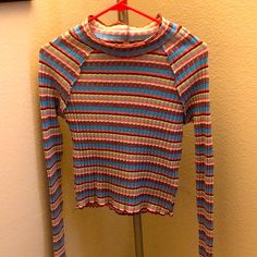 Perfect Condition Multicolor Turtleneck Tops For Fall, Striped Stretch Turtleneck Top, Yellow Ribbed Long Sleeve Top, Blue Funnel Neck Top For Winter, Multicolor Ribbed Long Sleeve Tops, Multicolor Long Sleeve Ribbed Top, Blue Funnel Neck Top For Fall, Fitted Multicolor Turtleneck Top, Fall Blue High Neck Tops