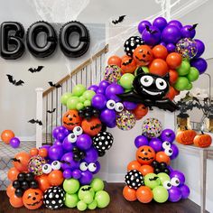 halloween balloons are arranged in the shape of a letter b and decorated with pumpkins