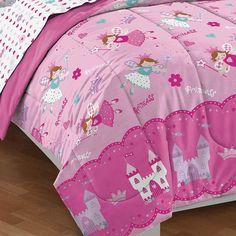 a pink bed with princess themed sheets and pillows