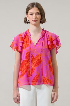 Add some statement prints to your new season wardrobe with this blouse. Featuring a pink and orange floral print with short layered sleeves, ruffle neck, and split neckline. It has an adjustable tie around the neck and maintains a classic fit. Wear it tucked into pants or shorts to go along. - Ruffle trim- Split neck- Neck tie- Ruffle layered sleeves- Color: Orange Pink MultiSize + Fit - Model is 5'8" and wearing size XS- Measurements taken from size S - Chest: 20"- Length: 24 1/2" Fabric Self: Layered Sleeves, Orange Floral Print, Short Layered, Orange Pink, Ruffle Trim, Color Orange, New Season, Pink And Orange, Neck Tie