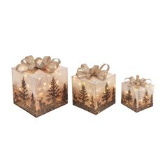 three small boxes with lights and bows on them