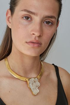 Discover the Elegance of Sustainable Jewelry . Our unique sustainable jewelry designs are not only ethically sourced and handcrafted, but they're also created with the modern woman in mind. Each piece is designed to make women feel beautiful, elegant, and powerful. Our craftsmen combine eco-friendly materials with unpa Luxury Brass Necklaces, Gold Gemstone Choker, Elegant Gold Necklaces With Raw Stone, Elegant Gold Necklace With Raw Stone, Handmade Gold Crystal Brass Necklace, Gold Quartz Jewelry With Natural Stones, Luxury Polished Brass Necklaces, Unique Luxury Brass Necklaces, Luxury Silver Brass Necklace