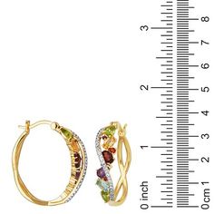 Gold-plated Multicolor Multigemstone and Diamond Hoop Earrings  These unique, criss-cross hoop earrings feature a rainbow of colorful gemstones set off with the chic sparkle of white diamond and sapphire accents. The luxe mix of semi-precious stones includes beautiful blue topaz, purple amethyst, red garnet, orange citrine and green peridot.       Measures approx. 29.5mm x 7.6mm     Stamped .925; 18K yellow gold plating     Pierced with joint-and-catch closures     Hoop earrings have criss-cross design     Front side of hoops feature multicolored gemstones     Curved piece on front lined with round, created white sapphires and white diamond accents   Stone Information       All sizes and weights approximate     Blue Topaz - Oval-cut; 2pcs; 0.51cts     Amethyst - Faceted round; 2pcs; 0.08ct Multicolor Fine Jewelry Hoop Earrings As Gift, Fine Jewelry Gemstone Hoop Earrings, Multicolor Hoop Jewelry For Anniversary, Multicolor Multi-stone Hoop Earrings As Gift, Multi-stone Hoop Jewelry For Gifts, Fine Jewelry Multi-stone Hoop Earrings For Anniversary, Elegant Multicolor Gemstone Hoop Earrings, Multicolor Gemstone Hoop Earrings In Fine Jewelry Style, Fine Jewelry Multicolor Hoop Earrings