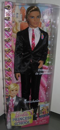 the barbie doll is wearing a black suit with pink tie and white shirt, but no shoes