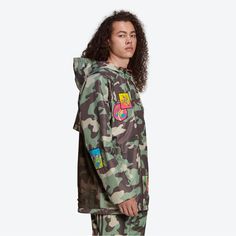 Adidas X Jeremy Scott Windbreaker Jacket Camouflage Xl Underarm To Underarm 27 Inches Length 33 Inches Sleeve 27 Inches Measurements Laying Flat Adidas Originals And Jeremy Scott Continue Their Ongoing Partnership With Their Introduction Of The Windbreaker. The Polyester-Constructed Silhouette Is Breathable For All Times Of Wear And Incorporates A High-Neck Zip-Up Design For Adjustability. Elastic Cuffs And Hem Are Placed For Further Detail, While The Hood Features Bungee Components And A Netted Sporty Long Sleeve Camouflage Outerwear, Adidas Green Winter Windbreaker, Adidas Green Winter Outerwear, Adidas Green Outerwear For Winter, Camouflage Long Sleeve Parka For Streetwear, Long Sleeve Camouflage Parka For Streetwear, Adidas Green Outerwear For Streetwear, Adidas Urban Outerwear For Outdoor, Camouflage Long Sleeve Windbreaker For Streetwear