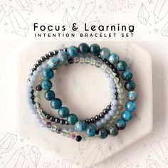 "FOCUS & LEARNING intention set Krisiaart crystal bracelets for Focus - Leaning - Concentration will help you get your creativity flowing so you will feel inspired to start on your project, focus and keep your attention, increases concentration, assists in learning, and boost your self-confidence that you can tackle anything. Bringing together the attracting powers of Fluorite, Apatite, Hematite, and Angelite you can say yes to the school success. CRYSTAL INFO: * Fluorite - Is a great study aid Apatite Bracelet, Exam Success, Intention Bracelets, School Success, College Student Gifts, Intention Setting, Crystal Healing Bracelets, Student Gift, College Student