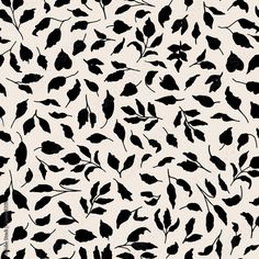 a black and white pattern with leaves on it