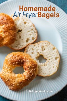 two bagels on a plate with the words air fryer easy bagsel above them