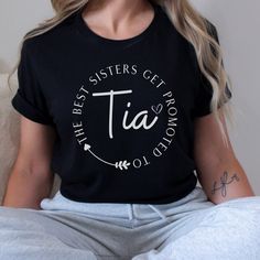 The Tia shirt is the perfect gift for your favorite aunt. This super soft shirt features "The Best Sisters Get Promoted to Tia" design, making it a thoughtful and unique present for any occasion. Show your appreciation for your beloved Tia with this one-of-a-kind gift that she will cherish for years to come. *Product Details - Printed with ink - Unisex T-Shirt - Ultra soft Bella Canvas 3001 - Designed with high quality pre-shrunk combed and ring-spun cotton - Features a crewneck with shoulder to Tia Announcement, Pregnancy Announcement Shirt, Best Sister, Unique Presents, Sister Gifts, Pregnancy Announcement, Art Collection, Good Things, Bathing Beauties