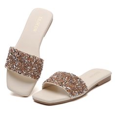 PRICES MAY VARY. 【Chic Look】The Crystal Rhinestone Slides showcase a glamorous aesthetic with their sparkling diamond-like accents. 【Comfortable Fit】 With their contoured footbed, these sandals compliment the natural arch and curves of your feet for enhanced comfort. 【Durable Material】 Constructed with high-quality materials, long-lasting use and can withstand daily wear and tear. 【Versatile Design】 The sleek and stylish design makes these slides an ideal choice for every occasion, from beach ou Party Gold Flip Flops With Rhinestones, Elegant Bedazzled Gold Sandals, Glamorous Bedazzled Flat Sandals, Rhinestone Flat Flip Flops For Beach, Elegant Gold Rhinestone Flip Flops, Glamorous Aesthetic, Rhinestone Slides, Fashion Slippers, Summer Slippers