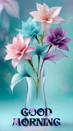 a vase filled with pink and blue flowers on top of a green table next to the words good morning