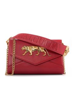 Rouge Bengal rectangular-shaped sling bag with gold-tone signature Royal Bengal Tiger carved logo, flap detail and embossed chain sling strap.
Type: Embellished
Color: Red
Rectangular-design
Flap bag
Dimensions (in cm): 24 x 15 x 5 - Aza Fashions Royal Bengal Tiger, Bengal Tiger, Evening Clutch Bag, Designer Wear, Online Bags, Flap Bag, Clutch Purse, Aza Fashion, Sling Bag