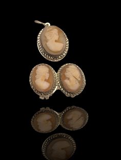 "This vintage 800 silver hand carved Shell Cameo set is  just beautiful and very classy! The earrings and  matching pendant are  in superb condition, ready for wearing  The carvings depict pretty women in profile with curly hair, The three women are all different, as is normal that it is, since it is a handmade work Every oval cameo section has delicate & decorative ruffled edge,  and the Shell is bezel set with open back Expertly crafted, Elegant and graceful work,  this 1960's vintage silver C Elegant Silver Carved Earrings, Elegant Cameo Clip-on Earrings Gift, Classic Cameo Earrings For Wedding, Antique Clip-on Earrings For Anniversary, Antique Silver Clip-on Earrings For Wedding, Victorian Style Clip-on Jewelry For Vintage Events, Antique Clip-on Jewelry For Vintage Events, Antique Silver Clip-on Jewelry, Antique Clip-on Jewelry For Wedding