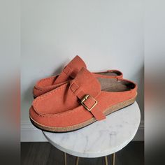 Unbranded Clog Style Leather Shoes With Buckle Strap Orange Size 9 Never Worn Casual Closed Toe Clogs With Cork-bed Midsoles, Casual Clogs With Cork-bed Midsoles, Orange Mules With Removable Insole And Round Toe, Casual Slip-on Clogs With Cork-bed Midsoles, Casual Mules With Buckle Closure And Round Toe, Comfortable Flat Heel Mules With Buckle Closure, Casual Slip-on Clogs With Buckle Closure, Comfortable Flat Clogs With Buckle Closure, Spring Comfortable Clogs With Buckle Closure