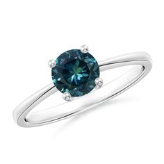 Simple yet elegant, this solitaire Montana sapphire ring in 14k white gold is sure to turn heads. It has a sleek and reverse tapered shank that looks stylish. The round teal sapphire is held in a compass-style prong setting. Teal Montana Sapphire is the Birthstone for the month of September and traditional gemstone gift for 5th & 45th wedding anniversaries. All our items are packaged with care in appealing boxes with plush interiors. Embellished with AAA  Best quality 1 Carat Teal Montana Sapphi Blue Solitaire Emerald Ring In Classic Style, Blue Solitaire Emerald Ring Classic Style, Blue Solitaire Emerald Ring, Round Shape, Blue Round Solitaire Emerald Ring, Blue Solitaire Emerald Ring Round Shape, Modern Solitaire Sapphire Ring With Round Band, Modern Round Solitaire Sapphire Ring, Modern Solitaire Birthstone Ring With Round Cut, Montana Sapphire Ring