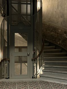 an image of a staircase with glass doors