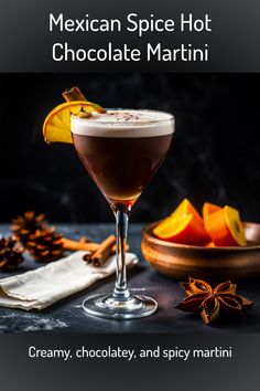 the mexican spice hot chocolate martini is served in a coupe glass with an orange slice