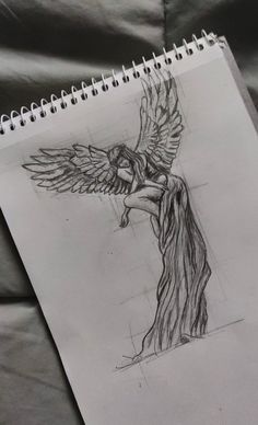 a pencil drawing of an angel holding a child on his back with wings spread out