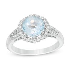 Provide a regal essence with this splendid gemstone ring. Fashioned in sterling silver, this intriguing look features an 8.0mm sky-blue topaz centered in an octagon-shaped halo of shimmering lab-created white sapphires. Additional created sapphires line the shank. Polished to a bright shine, this design pairs well with her evening attire. This ring is custom-made to fit your ring size. Sterling silver rings cannot be resized after purchase. Fine Jewelry Light Blue Sapphire Ring With Center Stone, Light Blue Brilliant Cut Fine Jewelry Ring, Light Blue Aquamarine Ring With Diamond Accents, Elegant Light Blue Sapphire Ring, Fine Jewelry Aquamarine Diamond Ring With Center Stone, Elegant Light Blue Sapphire Ring With Center Stone, Elegant Light Blue Topaz Birthstone Ring, Elegant Blue Topaz Ring With Center Stone, Aquamarine Diamond Ring With Diamond Accents