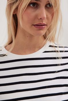 Looking for a way to get cozy and comfortable in style? Look no further than the Wren Striped Loose T-Shirt by Bella Chix! This short-sleeved knitted shirt is perfect for relaxing at home or letting loose in a fun evening with friends. Its unique stripes will have you standing out wherever you go! Who said you have to sacrifice comfort for fashion? Not us! Product Specifications Sleeve Length: Short Material: Cotton, Spandex Fit Type: Regular Elasticity: Medium Stretch Collar: O-Neck Length: Reg Trendy Short Sleeve Knit Top For Loungewear, Casual Short Sleeve Knit Top, Striped Cotton Crew Neck Knit Top, Striped Cotton Knit Top With Crew Neck, Comfortable Crew Neck T-shirt For Day Out, Comfortable Short Sleeve T-shirt For Day Out, Effortless Crew Neck Top For Day Out, Everyday Cotton Knit Top With Short Sleeves, Casual Striped Cotton Knit Top