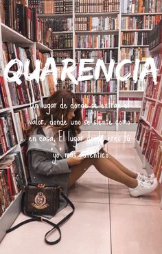 a woman sitting on the floor in front of a book shelf filled with lots of books