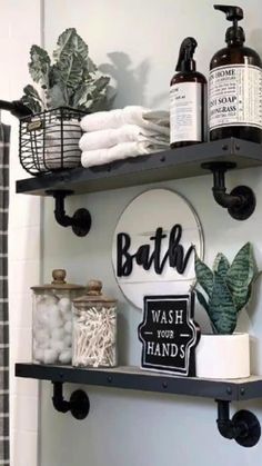 a bathroom with two shelves holding various items