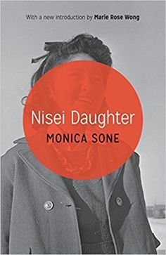 a woman standing in front of a red circle with the words nisel daughter on it