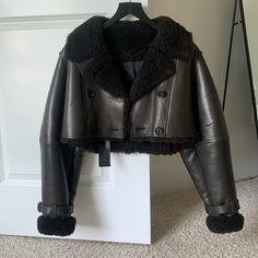 Burberry Prorsum Leather Jacket With Shearling Lining. Very Cropped, Trench Style. Size Uk 38. Never Been Worn. Original Tags. Original Price Is $5,500. Chic Long-sleeve Sheepskin Leather Jacket, Chic Shearling Leather Jacket With Long Sleeves, Luxury Black Cropped Jacket For Winter, Black Luxury Cropped Jacket For Winter, Luxury Long Sleeve Cropped Jacket For Winter, Leather Shearling Jacket, Burberry Prorsum, Burberry Jacket, Shearling Jacket