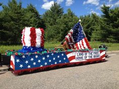 a boat decorated with red, white and blue decorations