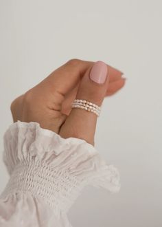 Delicate Pearl Ring Freshwater Pearl Stretch Ring | Pearl Stack Ring, Dainty Pearl Ring, Pearl Eternity Band #pearl #pearlring Dainty Adjustable Pearl Stackable Rings, Delicate Adjustable Pearl Rings, Pearl White Dainty Rings With Pearl Charm, Dainty Handmade Adjustable Pearl Ring, Minimalist Stackable Adjustable Pearl Ring, Stretch Ring, Crystal Rings, June Birth Stone, Pearl Ring