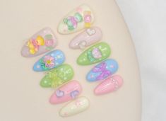 Embrace the enchanting charm of our Hand Painted 3D, Colorful, Cute Beach Nails! This handcrafted manicure set features a delightful mix of pastel colors adorned with 3D gummy bear and butterfly accents, perfect for adding a touch of whimsy and fun to your look. Summary: Our press-on nails are reusable, easy to apply, and offer a perfect, non-damaging manicure in seconds at a fraction of the salon's cost. You can change them daily to match your outfit. 🌟💅 Key features: 🎨Handmade by our profes Cute Beach Nails, Bear And Butterfly, Painted Acrylic Nails, Kawaii Charms, Candy Nails, Wonderland Artwork, Confetti Nails, Bears Nails, Korean Nail Art