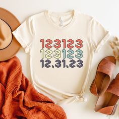 "123123 T-Shirt, Last Day Of 2023 123123 Sweatshirt, NYE 2024, 12 31 23, New Year Funny Shirt, New Years Eve Party Shirt, 2024 New Year Gift Premium Quality Printed in the USA. HOW TO ORDER ----------------------- 1-) Check and Review all Photos. 2-) Select Your T-Shirt Size from drop down menu. 3-) Choose Your Quantity you want. 4-) Click ADD TO CART. And, you can go back to add more product for your family members or You can complete the checkout process. 5-) Please Click \"Proceed to Check Out\" 6-) Your order will be ready to ship 2-5 Business Day. ABOUT US --------------- We are a husband-and-wife team who believe that beauty is all around us, and we strive to capture it in our designs. Thank you for choosing to shop with us, and we hope you find something that inspires you! For custo 123123 New Years Eve, Nye 2024, New Years Eve Shirt, Football Mom Shirts, Fall Maternity, Foto Baby, New Year Gift, Baby T Shirts, Thanksgiving Shirts