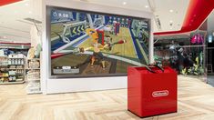 an image of a video game display in a mall or shopping center that is empty