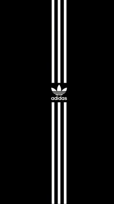 the adidas logo is shown in black and white on a dark background with vertical stripes