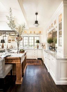 the kitchen is clean and ready to be used for cooking or baking, while also being used as a dining room