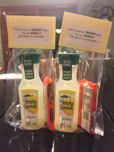 two bottles of simply mayonnaise are sitting on a countertop in plastic bags