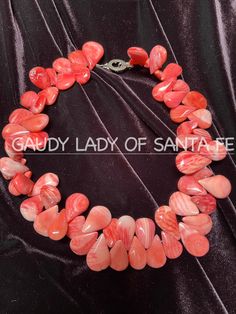 Peach Coral Magnesite Teardrop Choker Necklace. 16 inch, 7.1 oz. The teardrops are not suppose to lie flat. It fluffs around the neck. GOOGLE MY WEBSITE FOR SOUTHWESTERN STYLE JEWELRY, VINTAGE, AND OTHER UNIQUE PIECES. gaudyladyofsantafe.com Handmade Pink Drop Necklaces, Handmade Pink Teardrop Necklaces, Handmade Pink Teardrop Necklace, Coral Necklace, Southwestern Style, Jewelry Vintage, Style Jewelry, My Website, Unique Pieces