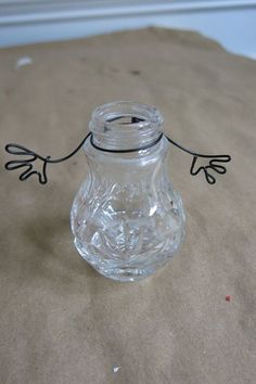 a glass jar with a cartoon figure on it