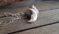 This celestial crescent resting moon pendant necklace is made by using the ancient lost wax technique and it is hand forged. It comes in a sterling silver chain of your choice or a waxed cord and the pendant is solid sterling silver made in great detail. A unique, ethereal piece of jewelry that will add character to any look and is ideal as a gift to yourself or to someone special. The total length of the chain is 460mm, please contact me if you would like me to custom made the length of your ch Unique Moon-shaped Sterling Silver Necklace, Silver Hand Forged Crescent Necklace, Hand Forged Sterling Silver Celestial Necklace, Hand Forged Crescent Sterling Silver Necklace, Hand Forged Silver Crescent Necklace, Hand Forged Sterling Silver Crescent Necklace, Silver Moon Necklace, Raw Diamond Rings, Moon Necklace Silver