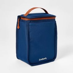 Take your lunch with you whether you're headed to the office or camping with the family with this Upright Lunch Bag from Embark™. This upright fabric lunch bag helps keep food fresh for longer. It features a zippered main compartment with a three-liter capacity plus a side mesh water bottle pocket, giving you plenty of space for snacks or a lunch as well as a beverage. Embark™: Find wonder as you wander. Functional Blue Lunch Bag With Zipper, Practical Lunch Bag With Zipper Closure, Practical Lunch Bag With Zipper For Travel, Rectangular Lunch Bag With Zipper For Outdoor Activities, Rectangular Lunch Bag For Outdoor Activities, Practical Outdoor Lunch Bag With Zipper, Practical Outdoor Lunch Bag With Zipper Closure, Fabric Lunch Bag, Lunch Box Set