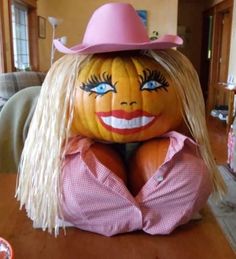 Dolly Parton Halloween Pumpkin. I love Dolly. Dollywood. Country Music Halloween. Pumpkin painting. Pumpkin with cowboy hat. Country girl halloween. Dolly Parton costume party. Southern Halloween. Nasheville Halloween. Pigeon Forge. DollyParton.  Cowgirl. Rodeo Halloween. Horse farm. 9 to 5. Barbie Pumpkin Ideas, Salem Witch Decorations, Diva Pumpkin Decorating, Cowgirl Pumpkin Painting, Pumpkin Painting Ideas For Breast Care Awareness, Spa Day Pumpkin Decorating, Pink Pumpkins Decorating, Pumpkin Contest Ideas No Carve Funny, Dolly Parton Pumpkin