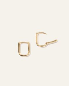 Mini U Huggie Hoops Classic Gold Jewelry With Rounded Edges, Gold Minimalist Jewelry With Rounded Edges, Minimalist Gold Jewelry With Rounded Edges, Timeless Gold-plated Huggie Earrings, Timeless Gold Tarnish-resistant Huggie Earrings, Classic Gold Huggie Earrings For Everyday Luxury, Gold Rectangular Huggie Earrings For Everyday, Classic Rectangular Yellow Gold Huggie Earrings, Classic Yellow Gold Rectangular Huggie Earrings