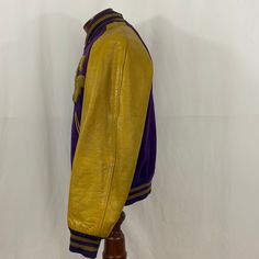 "True vintage from 1961 Purple and Gold letterman jacket- also know as a varsity jacket From Hatcher's per the tag in the pocket Not sure what school this was from but \"G\" It is literally reversible- SURPRISE!- guess after you graduated high school you could reverse it and wear it to work Sold AS IS so please ask questions Condition- good for its age Exterior -Leather sleeves in good condition- they could use some conditioning but not our forte -Wool is in great condition Interior shows wear - Vintage Varsity Jacket For College In Fall, Vintage Fall Outerwear For Sports Events, Vintage Winter Outerwear For Sports Events, Vintage Varsity Jacket For Fall Sports Events, Retro Outerwear For Game Day In Fall, Retro Fall Outerwear For Game Day, Vintage Varsity Jacket For Sports In Fall, Retro Varsity Jacket For Game Day Winter, Retro Winter Varsity Jacket For Game Day