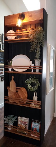 an open bookcase filled with lots of books