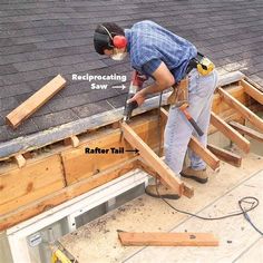 a man working on the roof of a house